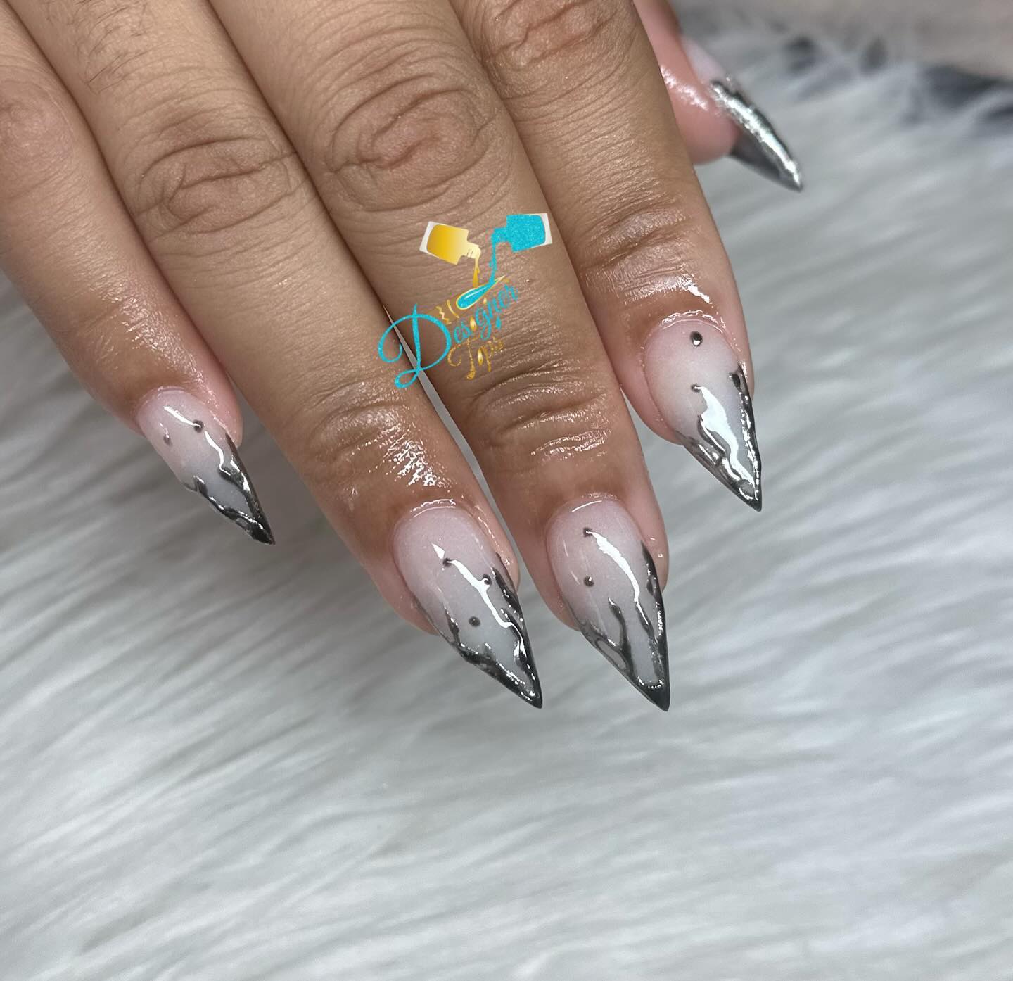 Elegant Stiletto Nails with Silver Accents