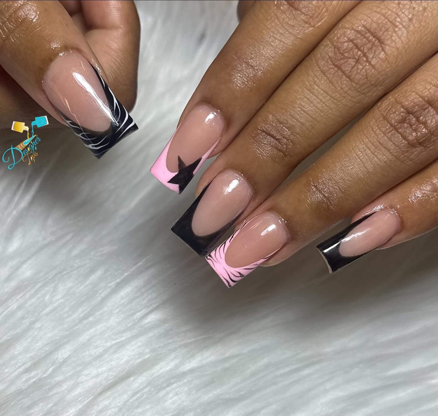 Artistic Pink and Black Nail Design
