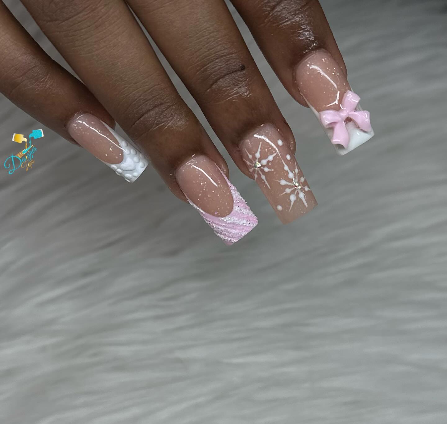 Stylish Nail Art with Bows and Patterns