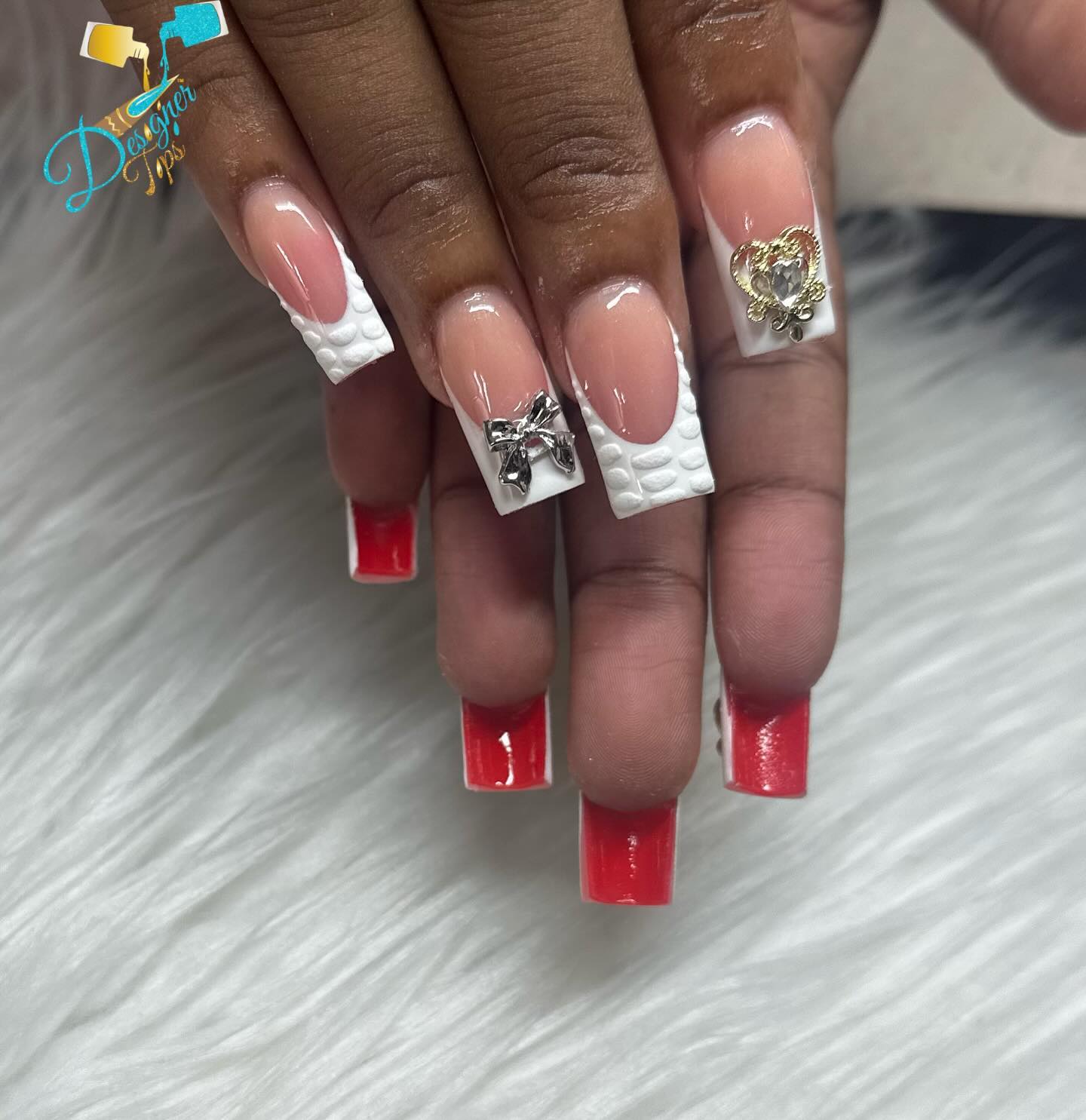 Elegant Red and White Nails with Charms