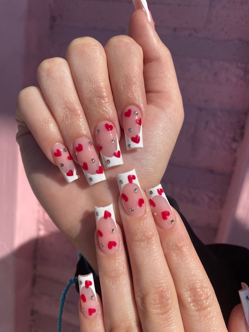 Artistic French Tip Nails with Hearts