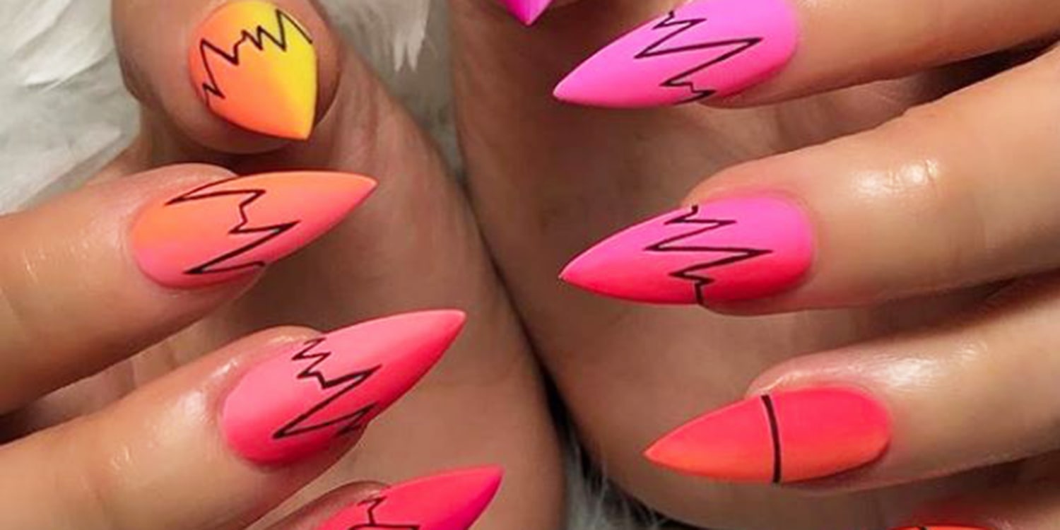 Vibrant Stiletto Nails with Artistic Detailing